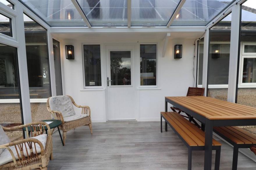 MANOR COTTAGE, pet friendly, with open fire in Embleton