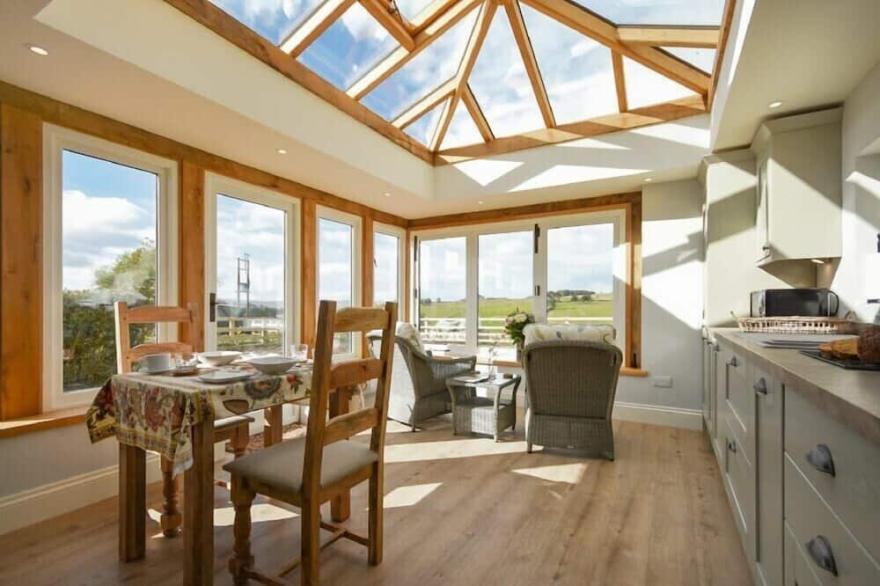 THE LODGE (ELSDON), pet friendly, country holiday cottage in Elsdon