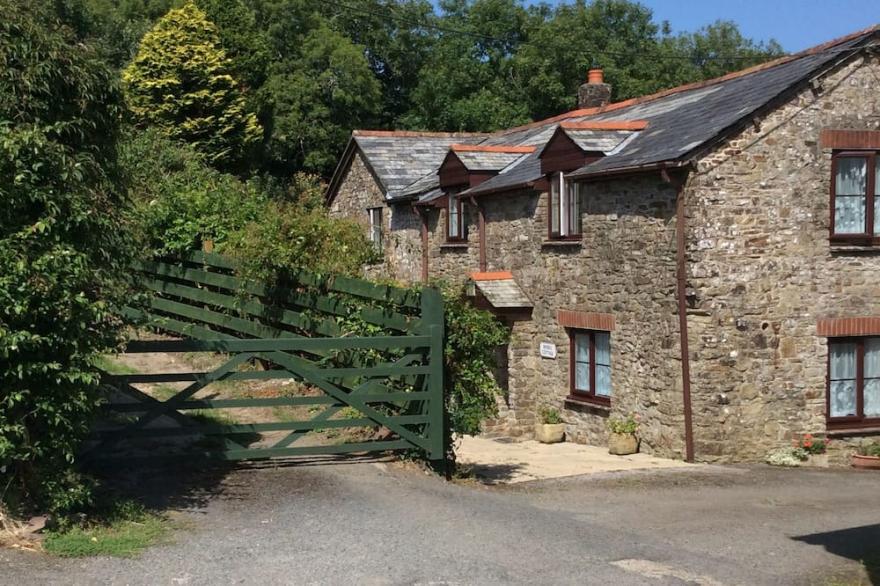 Picturesque semi detached converted cottage with private garden