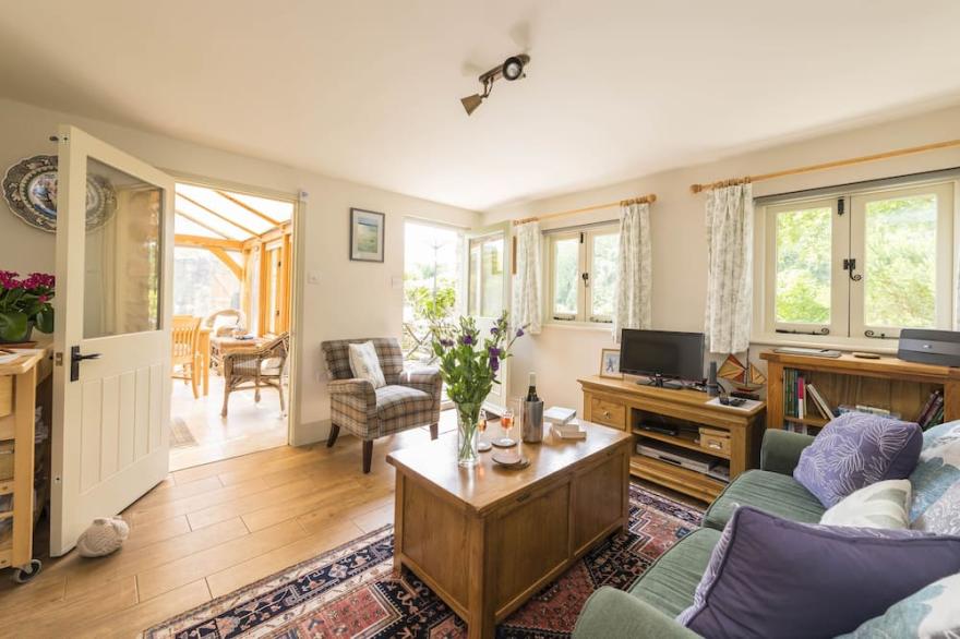A charming detached stone cottage situated on an elevated site above Upwey.