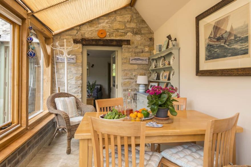 A charming detached stone cottage situated on an elevated site above Upwey.