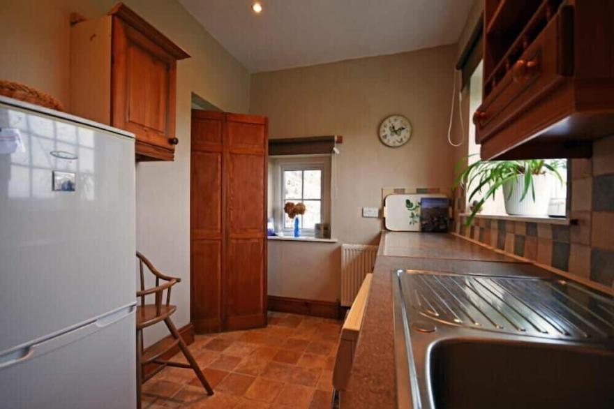 NO2 BUDLE BAY COTTAGE, pet friendly, with open fire in Bamburgh