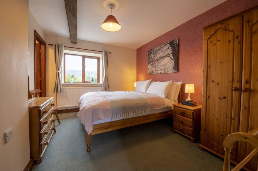 The Hay Barn is a spacious converted two story Yorkshire stone barn which sleeps ten guests, ideal f