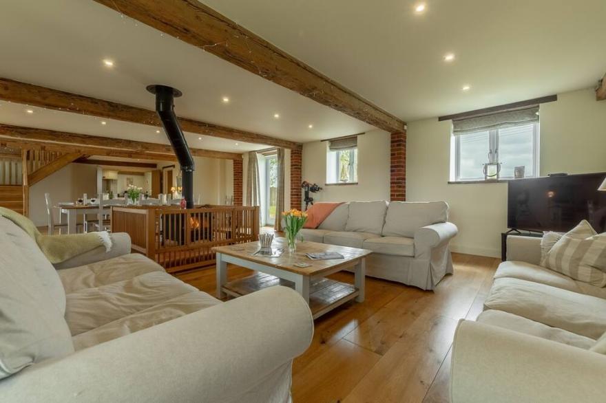 A fabulous, stand out conversion of a 19th century barn enjoying wonderful open rural views that ext