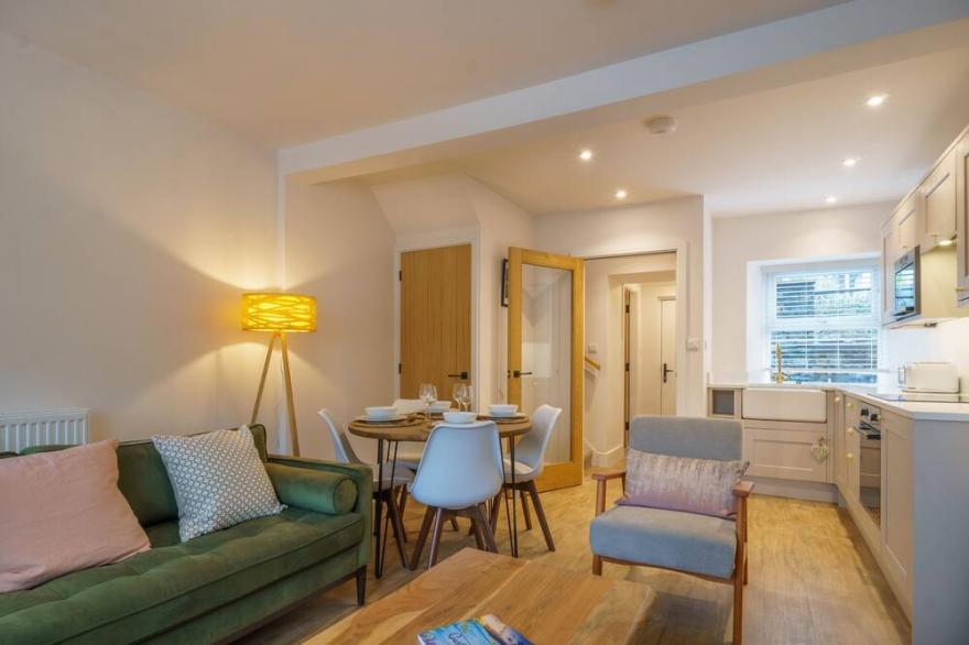 Wansfell Nook -  a cottage that sleeps 4 guests  is a beautifully-refurbished stone-built mid-terrac