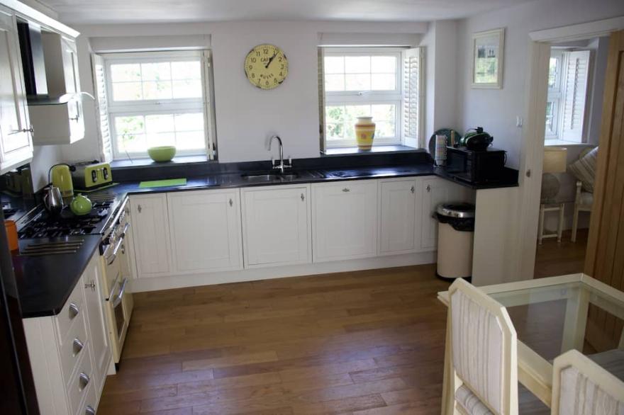 Coach House - Holiday Cottage on banks of Bude Canal and close to Beach