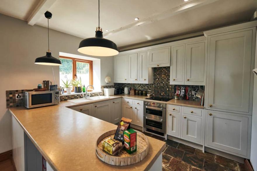 Brofallen, Bungalow tucked away close to the township of Laugharne is the outstanding Brofallen.