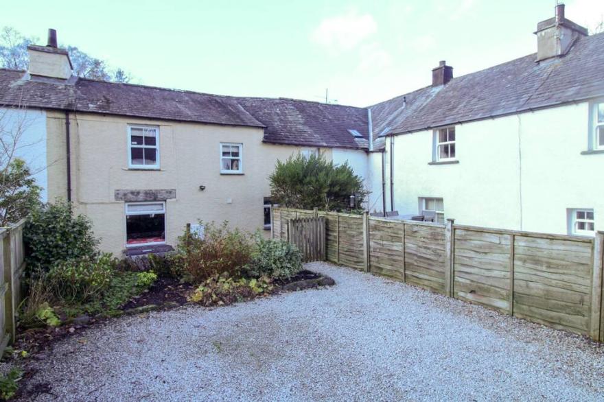 Woodside Cottage close to Windermere with wood burning stove, beams and leisure club included