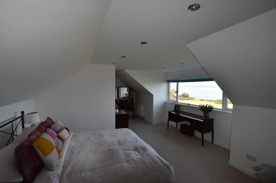 Waterfront Cottage with own Beach and Stunning Views Across The Clyde