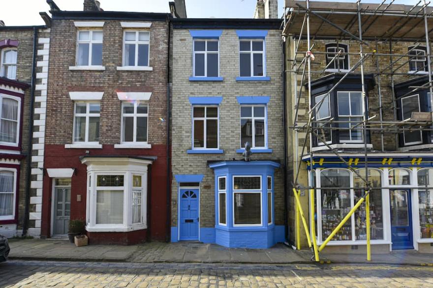 Large traditional house in the heart of old Staithes with outside courtyard.