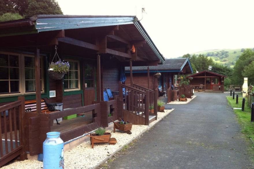 Finnish Holiday Lodges, set in wooded hillside, with mountain and stream views