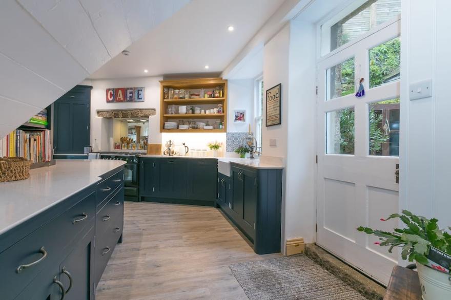 An immaculate three-storey Victorian house in Marazion, with private terrace, BBQ, parking and amazi