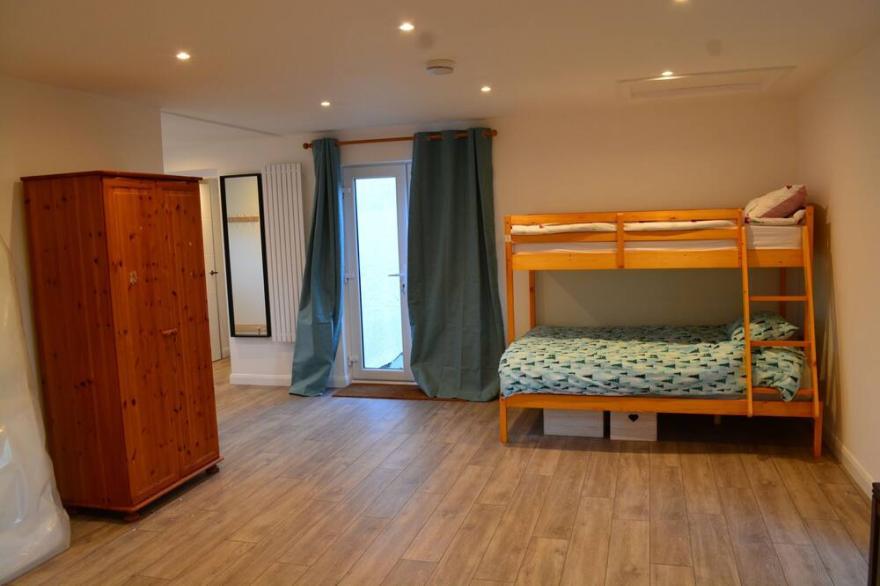 Indoor heated pool, games room and tennis court all private.