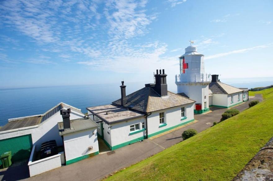 This attractive cottage on the Whitby Lighthouse site has a raised deck giving wonderful views.