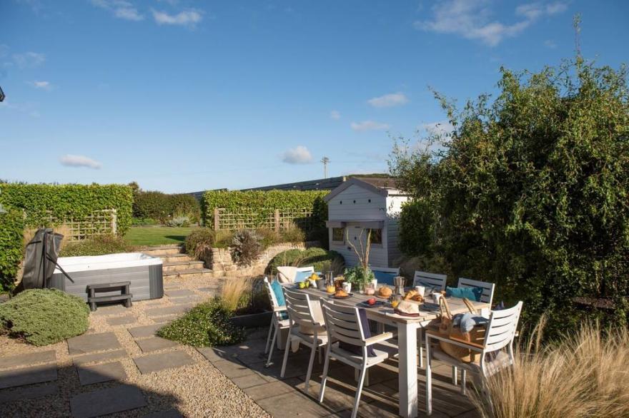 The Haybarn -A wonderful barn conversion with 4 bedrooms, large garden and parking near Mousehole
