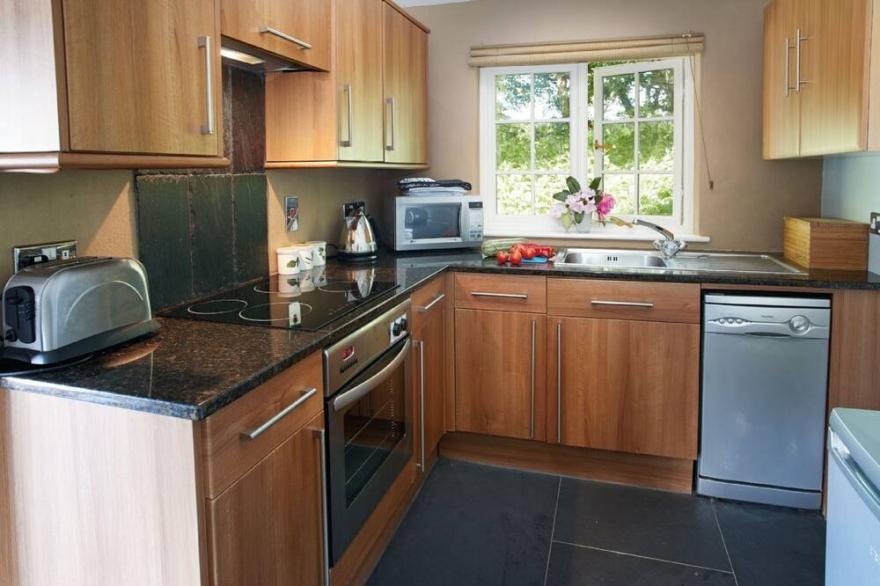 Four and a half miles south of Helston, this delightful cottage is situated on a tranquil estate.