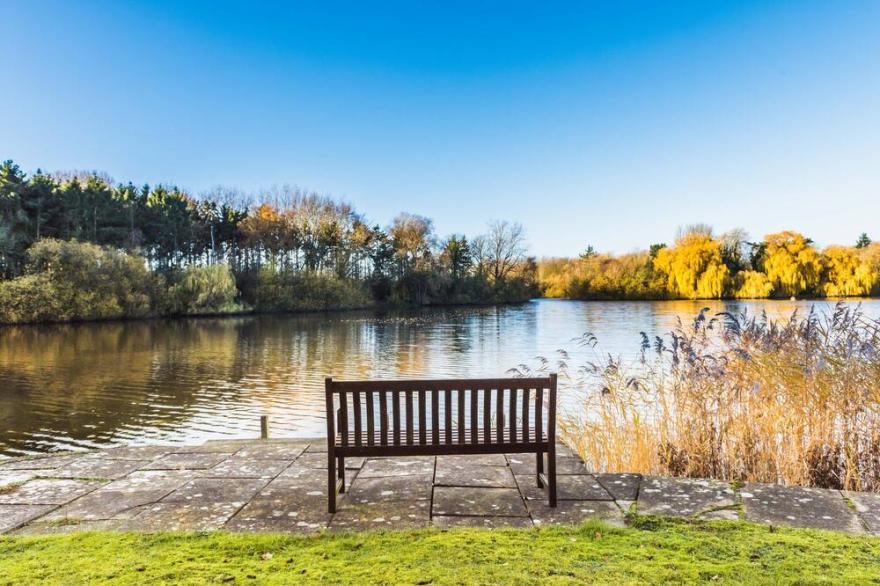 Luxury Lakeside Home In extensive grounds with boats, canoes and tennis court.