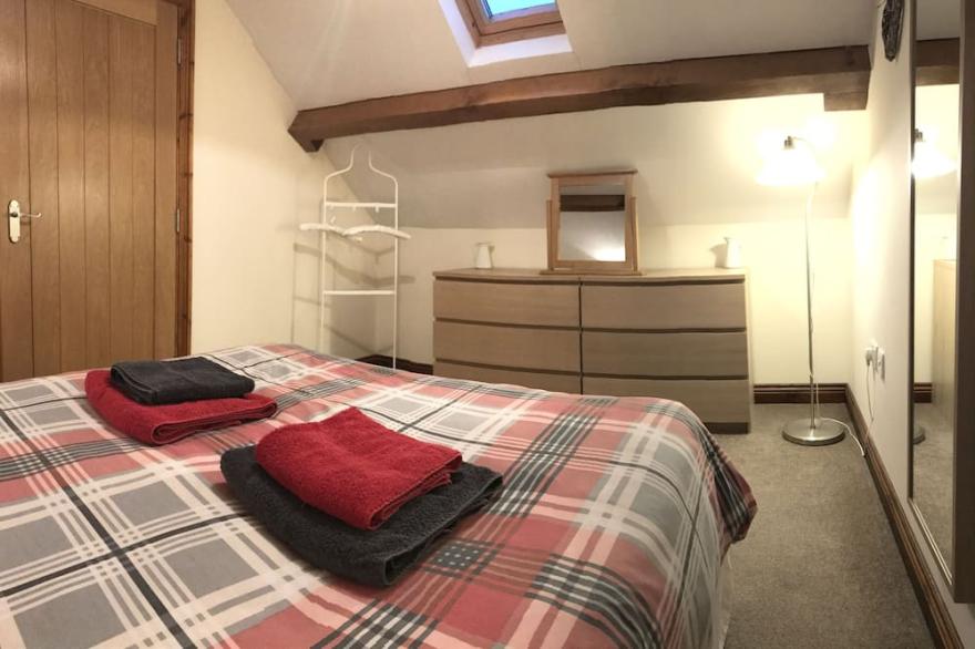 Barn conversion on small working farm