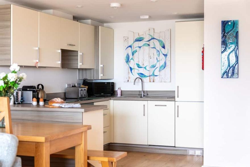 Karndu retreat, a ground floor apartment overlooking the RSPB reserve and part of a landmark development