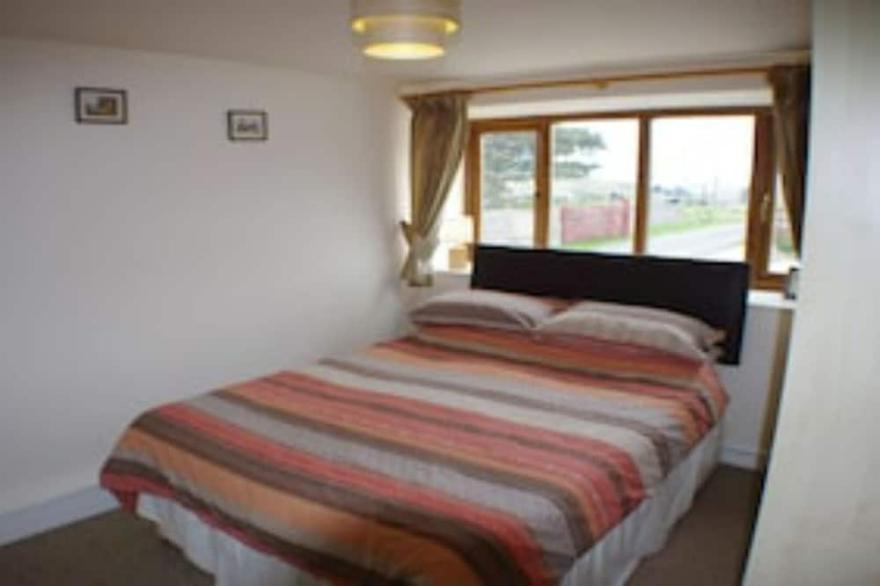 Cottage UCHAF, A barn conversion comprising two semi-detached cottages