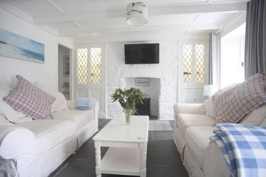 Traditional Cottage. 5 min walk to the beach, village setting.