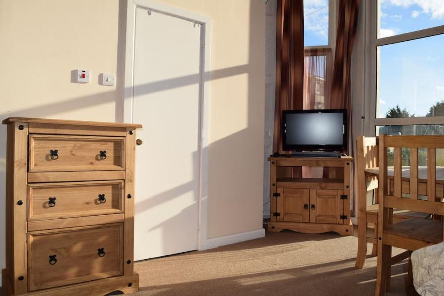 Tor Park Holiday Flatlets. Deluxe Studio Apartment for 2 adults and 2 children