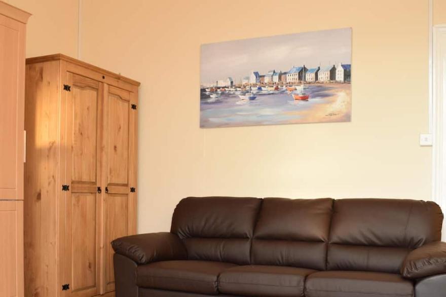 Tor Park Holiday Flatlets. Deluxe Studio Apartment for 2 adults and 2 children