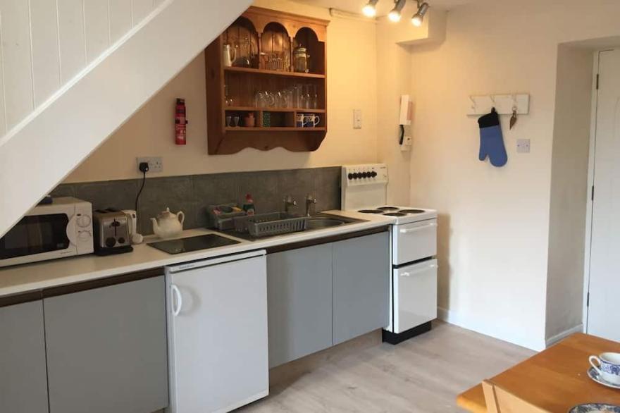 Cosy chapel cottage at quiet Peregrine Hall, ideal for social distancing.