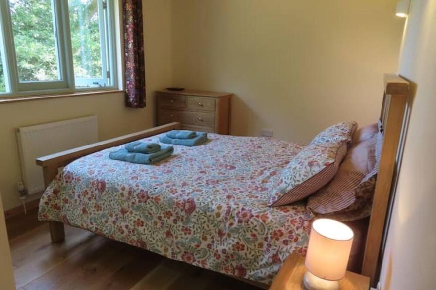 A secluded log cabin lodge with stunning views.