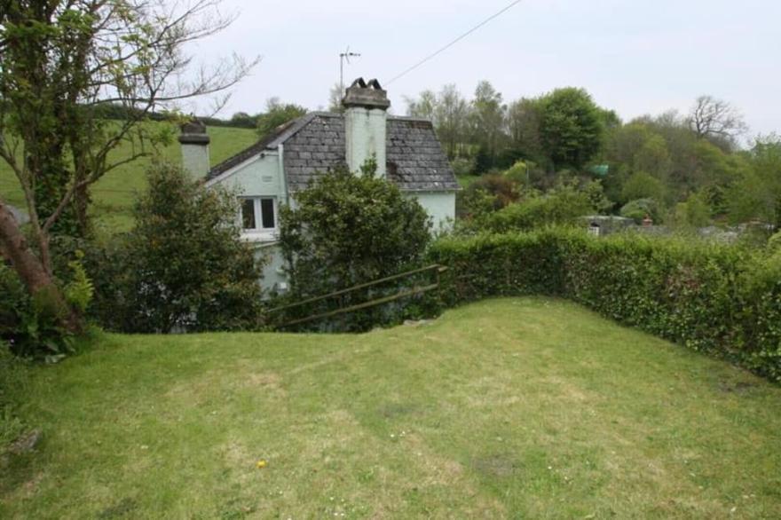The Moorings, a spacious double glazed house in an elevated position and just across from Fowey