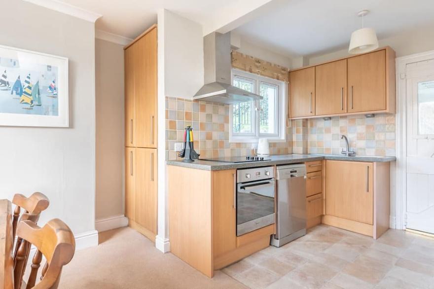 The Moorings, a spacious double glazed house in an elevated position and just across from Fowey