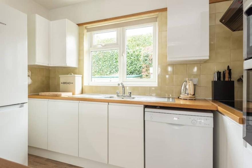Longships is an older bungalow offering superb sea views and cliffside garden