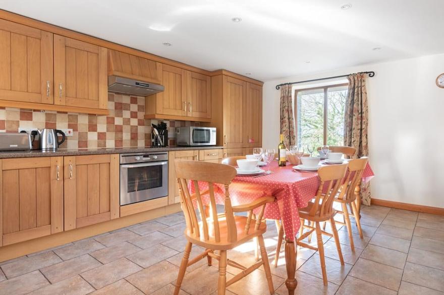 Hay Barn is a spacious stone barn conversion located on a working farm with beautiful countryside views