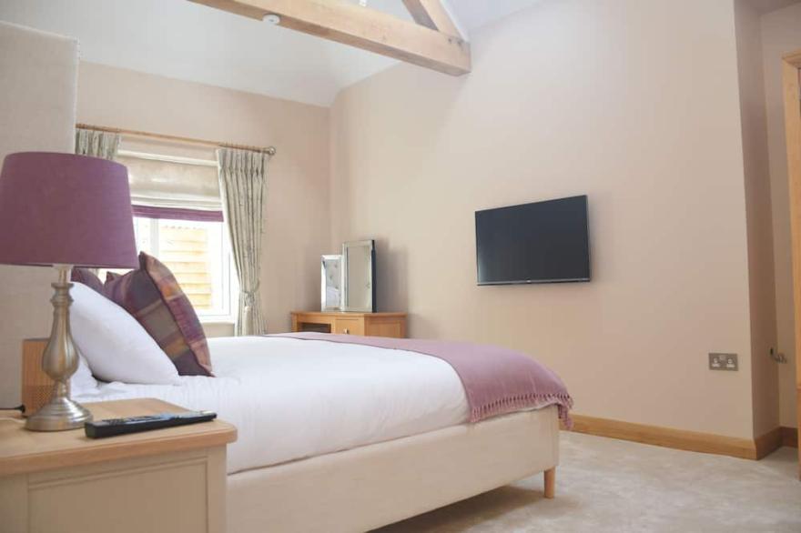 A luxury barn conversion, positioned in the heart of Broadway, Cotswolds
