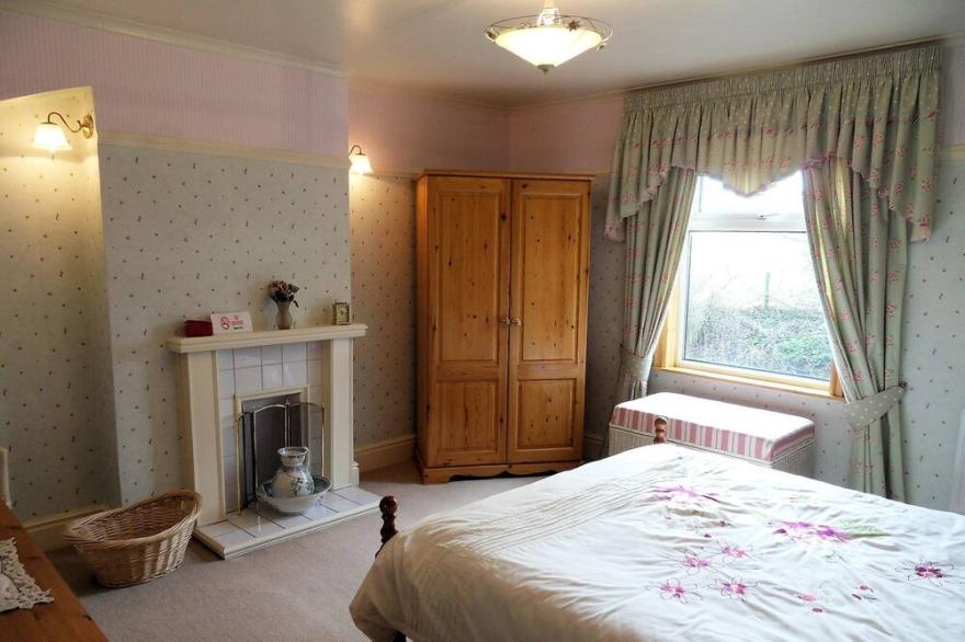 Character cottage with log effect fire and beamed ceilings