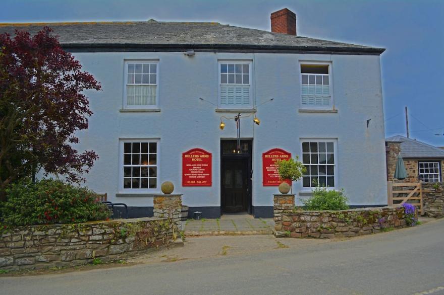 tea cosy cottage mid terrace cob house pub 500 meters beach 3 miles.