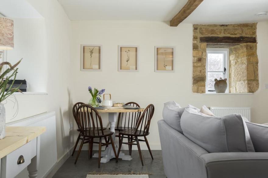 A charming cottage newly refurbished to provide a comfortable living space.