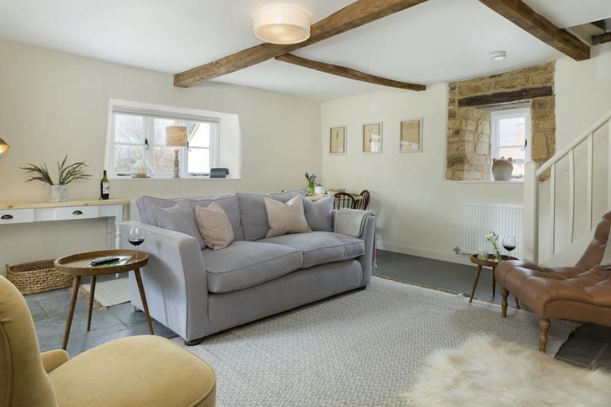 A charming cottage newly refurbished to provide a comfortable living space.