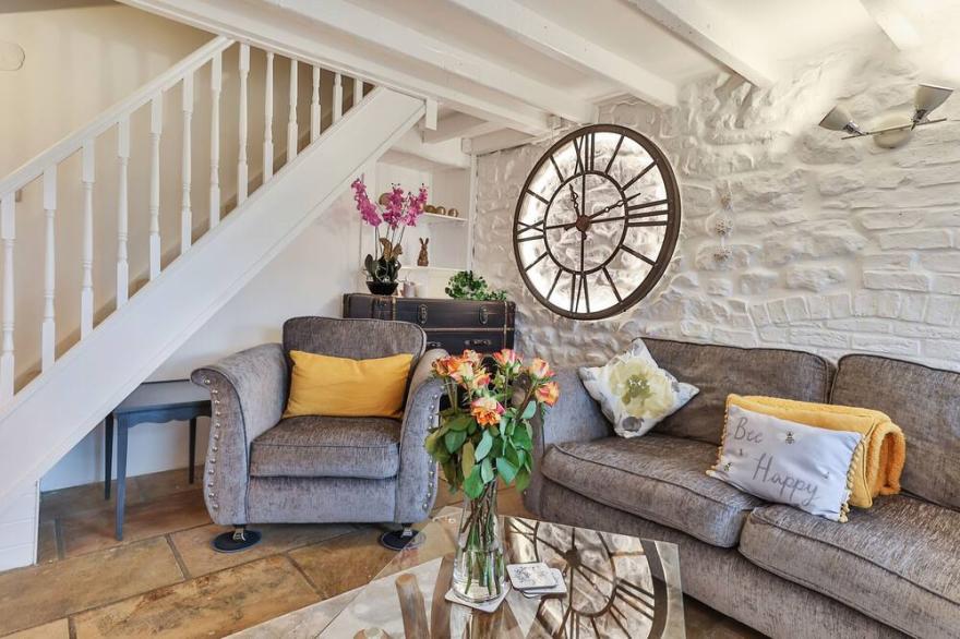 Beautiful boutique self-catering cottage with wood burner, parking & EV charger.