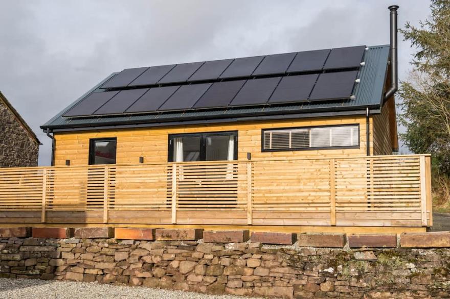Two bedroom, single-storey detached lodge.