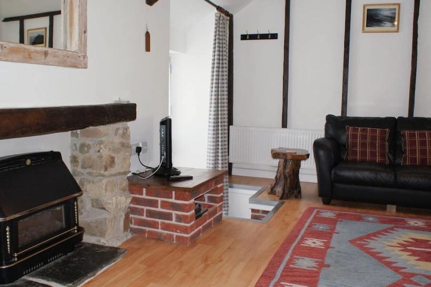 MILLERS COTTAGE, country holiday cottage, with a garden in Bude