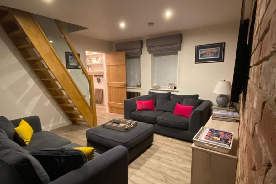 Fossil Bank, a luxury detached retreat in the heart of Alnmouth, with parking