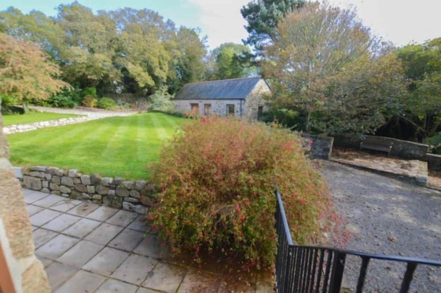 One of two delightful cottages within the beautiful grounds of Cusgarne House.