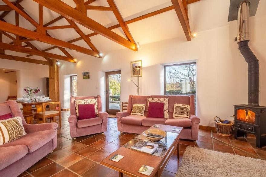 One of two charming cottages located within the grounds of Cusgarne House.