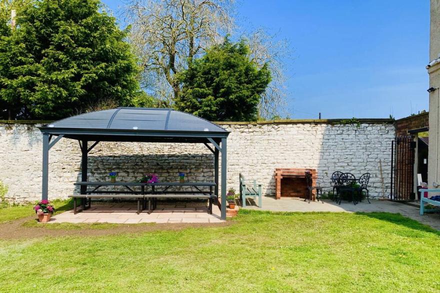 Reighton House sleeps upto 15 guests, dog friendly, games room, enclosed gardens