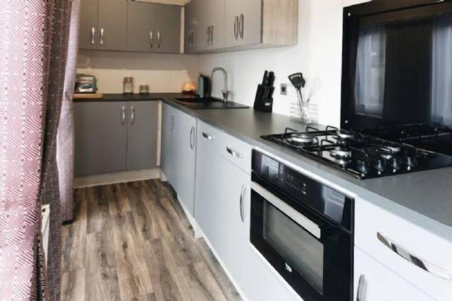 A luxury lodge 2 that sleeps 6 guests  in 2 bedrooms