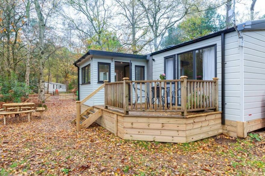 Wildwood - modern Kelling Heath caravan