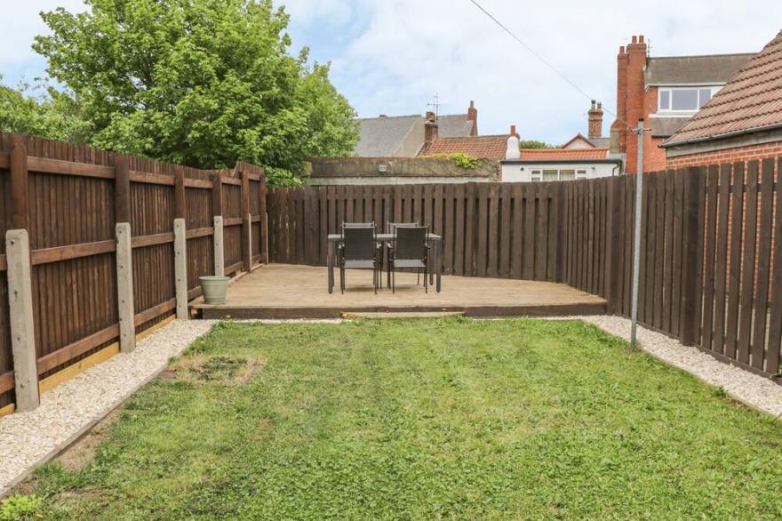 LILLY MAY COTTAGE, pet friendly, with a garden in Flamborough