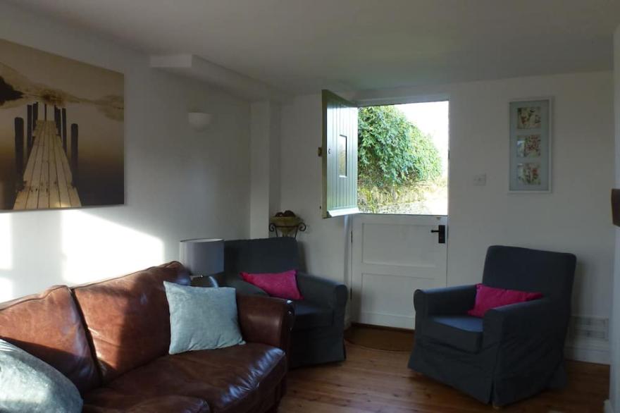 A charming cottage on the Lower Mill private nature reserve in The Cotswolds