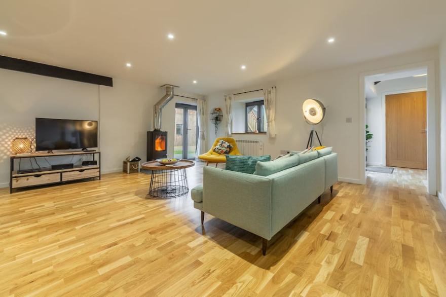 A single-storey barn conversion with access to wonderful coastal walks.